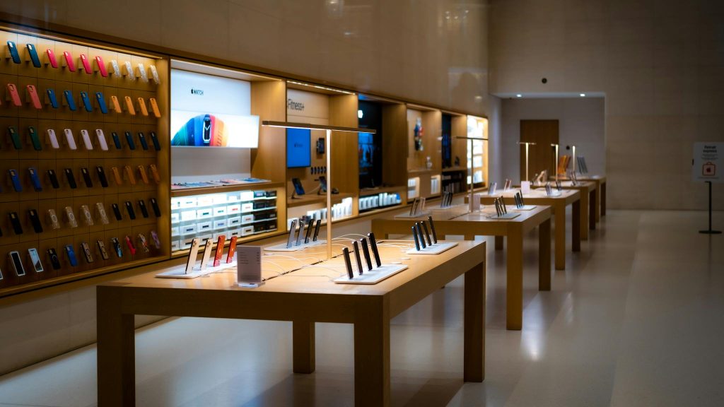 A Set of Tables and Shelves with Displayed Cellphones